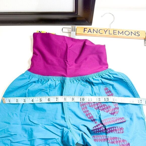 Zumba Wear NWT! Women's Up Down Cargo Capri Pants Lagoon Blue & Purple Size S - Picture 5 of 6